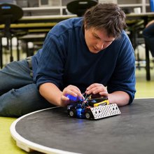 Student working on a sumo robot